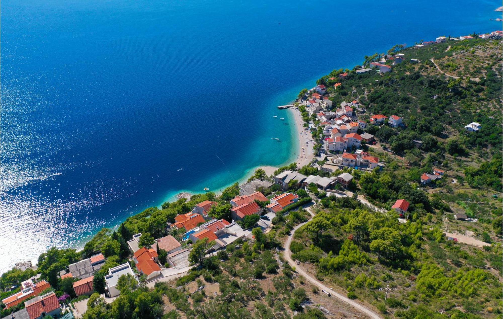 Nice Apartment In Krvavica With House Sea View Exteriör bild