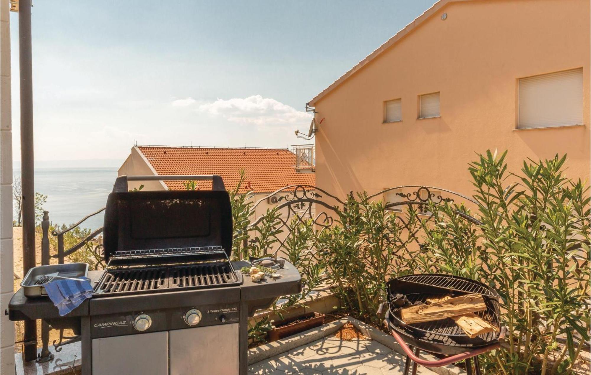 Nice Apartment In Krvavica With House Sea View Exteriör bild