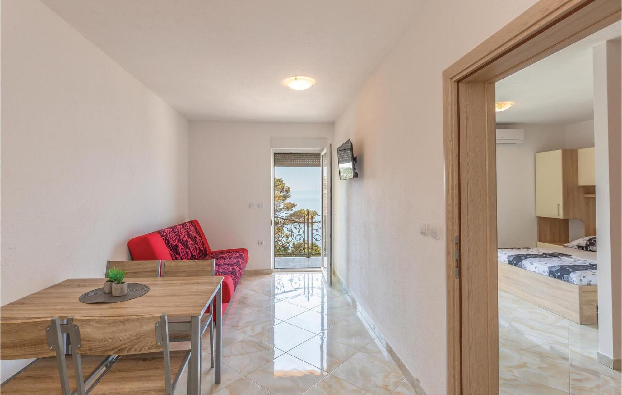 Nice Apartment In Krvavica With House Sea View Exteriör bild